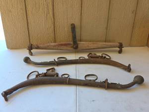 lot 1604 image: Yoke with Wooden Beam and Metal Hardware and Pair of Metal Hames