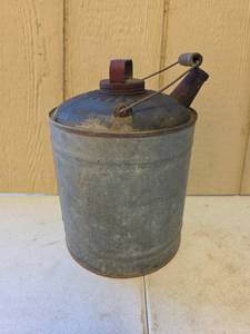 lot 1645 image: Cylindrical Metal Gas Can with Spout and Handle