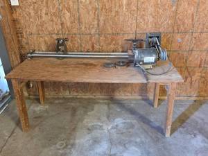 lot 1651 image: Sears Long Bed Wood Lathe with Craftsman Motor 12in. Diameter Mounted on 5ft Table