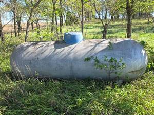 lot 2012 image: Horizontal Propane Tank 500gal. with Blue Cap and Fittings (UNKNOWN CONDITION)- see description for removal information