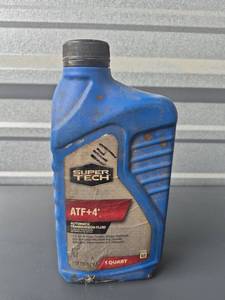 lot 250 image: Super Tech ATF4 Automatic Transmission Fluid 1 Quart - Bottle is Dirty But New