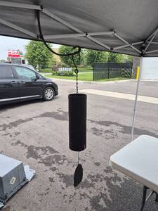 lot 273 image: Black Cylindrical Hanging Wind Chime with Chain