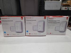 lot 11674 image: Honeywell T10 Pro Smart Thermostats, Falcon Stainless Water Expansion Tank, and More