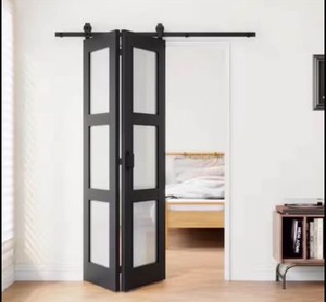 lot 23 image: 36 in. x 78 in. 3-Lite Tempered Frosted Glass Black Primed MDF Bifold Sliding Barn Door w Hardware Retails $200
