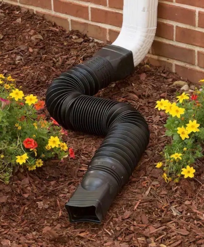 lot 81 image: Bundle of 3 Flex A Spout 55 in. Black  Vinyl Downspout Extensions
