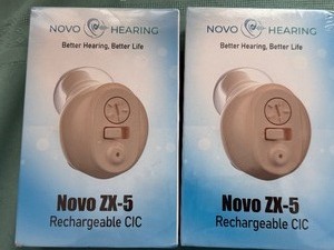 lot 182 image: Novo ZX-5, Rechargeable Completely-In-Canal Personal Sound Amplification Device (2), Both Sealed Packages