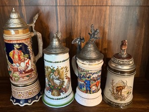 lot 180 image: Vintage German Steins, Tallest one is Musical