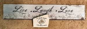 lot 415 image: Love, Laugh, Love Wall Art and a Love Themed Rock