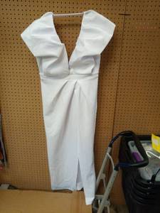 lot 1158 image: White Sleeveless Dress with Ruffled Neckline and Slit Skirt - Retail $0