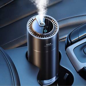 lot 1118 image: Ceeniu Smart Car Air Fresheners, New smell experience by Ultrasonic mist, Auto OnOff, Powerful Built-in Battery, Long lasting natural fragrance, Adjustable car freshener, Bamboo scent - Retail $26