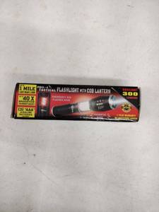 lot 63563 image: Pro-4 Tactical Flashlight