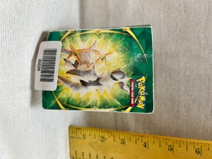 lot 36628 image: Lot of 40 Pokemon Cards in Small Folder.