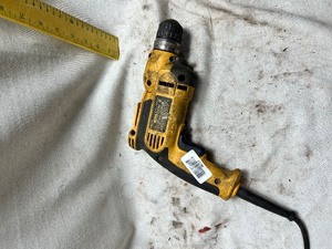 lot 36773 image: Dewalt Corded Electric Drill.