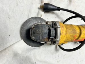 lot 36775 image: Dewalt Corded Electric Grinder.