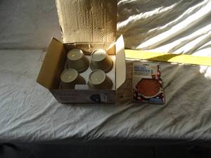 lot 37109 image: Bread bakers Flower Pots for Baking & Bread Warmer Pads.