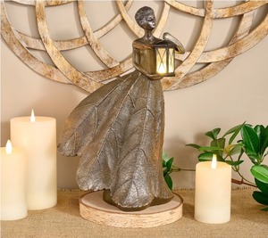 lot 1101 image: 16.5 InOutdoor Garden Maiden w Lit Lantern by Valerie, see note.
