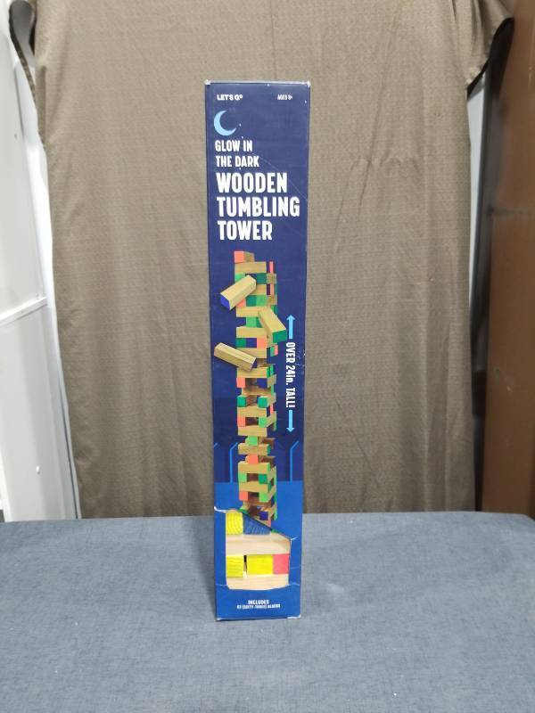 lot 2891 image: Glow in the Dark Wooden Tumbling Tower 53 Pieces One Is Missing