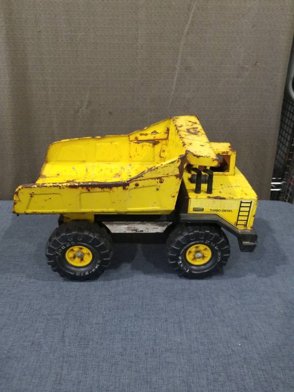 lot 2733 image: Yellow Turbo Diesel Dump Truck Toy Vehicle