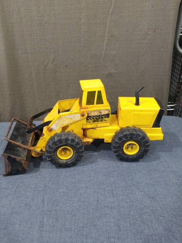 lot 2734 image: Mighty Diesel Wheel Loader Yellow Metal Toy Construction Vehicle