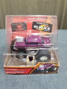 lot 1277 image: Slicks Muscle Battery Operated 57 Chevy Die-Cast Car
