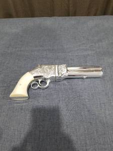 lot 1329 image: Volcanic Repeating Pistol Wild Country Cologne Miniature