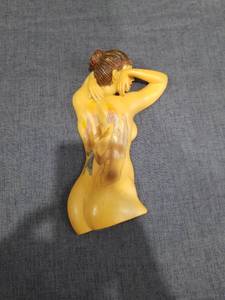 lot 1339 image: Yellow Female Figurine with Floral Back Decoration