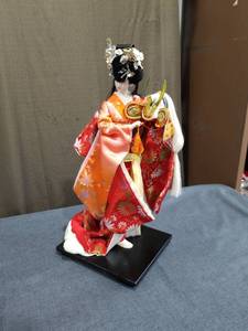 lot 1383 image: Asian Figurine Doll Red Orange Floral Robe White Base