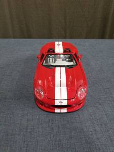lot 1401 image: Burago Shelby Series 1 1999 Diecast Model Car Red White Stripe