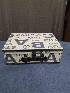 lot 1409 image: Decorative Storage Suitcase with Alphabet Print Pattern