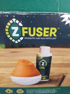 lot 1412 image: ZFuser Mosquito and Bug Repellent Device with Oil