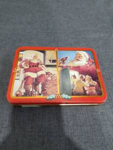 lot 1425 image: Coca-Cola Santa Playing Cards Tin Set Two Decks