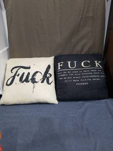 lot 1432 image: Lot of 2 Decorative Throw Pillows with Text Graphics