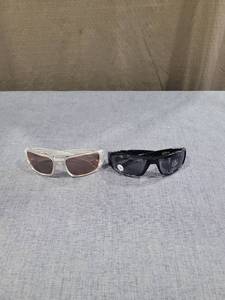 lot 1451 image: 2 Sunglasses Lot Clear Frame Brown Lens Black Frame Dark Lens