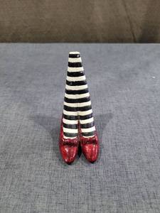 lot 1452 image: Raz Imports Wizard of Oz Dorothy Red Shoe with Striped Socks