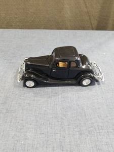 lot 1458 image: 1934 Ford Coupe Hardtop Classic Car, Black  Diecast Model Toy Car Headlight Missing See Pictures