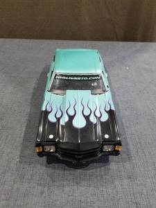 lot 1462 image: Maisto 124 Chevrolet Chevelle SS Die-Cast Model Car Turquoise Flames Hood Is Cracked See Pictures