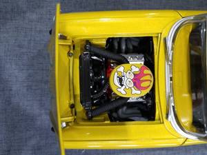 '57 Chevy Yellow Diecast Model Car with Flame Decals and Engine Detail Hot Wheels