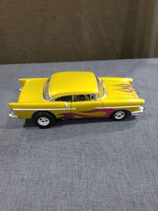 '57 Chevy Yellow Diecast Model Car with Flame Decals and Engine Detail Hot Wheels