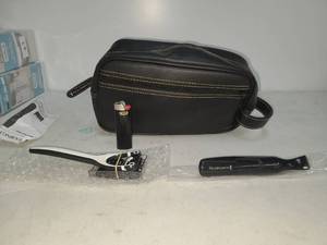 lot 30 image: Remington Grooming Kit with Toiletry Bag, Trimmer, and Accessories