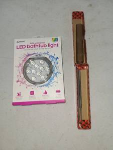 lot 52 image: Atomi 100% Waterproof LED Bathtub Light with IR Remote Control