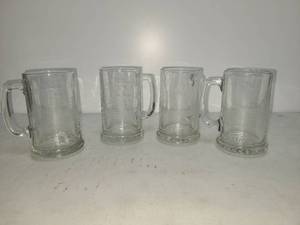 lot 97 image: Set of 4 Glass Beer Mugs with Etched Ship Designs