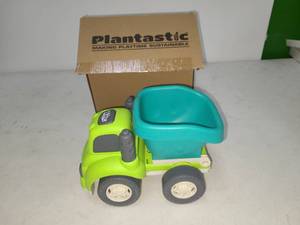 lot 118 image: Plantastic Zing Dump Truck Toy with Turquoise Bed