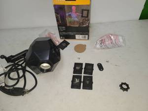 lot 120 image: LED Lightshow Illusion Projection Halloween Decorative Light with 4 Slide Discs