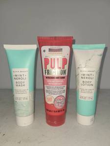 lot 134 image: Olivia Grace  Mint Neroli Body Wash 177mL, Soap & Glory Pulp Friction Body Scrub 250mL, Olivia Grace  Mint Neroli Body Lotion 177mL