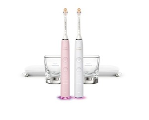 lot 1532 image: $274 PHILIPS Battery Powered Sonicare Diamond Clean Rechargeable Toothbrush for Complete Oral Care 2-Pack Handles Pink and White