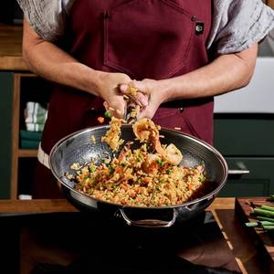 lot 1554 image: $199 HexClad 12 Hybrid Nonstick Wok & Lid, Induction-Ready, Dishwasher Safe  Oven Safe 12-Inch Wok with Lid
