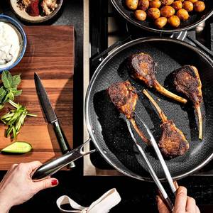lot 1567 image: $179 HexClad 12 Hybrid Nonstick Frying Pan, Dishwasher & Induction Safe  Stay-Cool Handles, Dishwasher and Oven Safe up to 900 F, Compatible with All Cooktops Pan 12-inch
