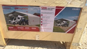 lot 1011 image: Unused SDLanch SDLC2030FT 20x30 All-Steel Carport with Enclosed Sidewalls