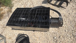 lot 1125 image: MINI SKID STEER mixing bucket attachment
