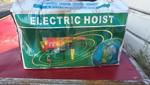 lot 41 image: Electric Hoist - Left outside